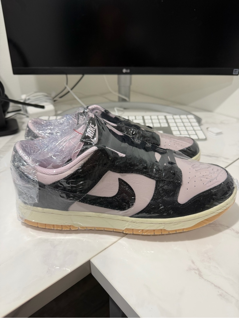 Nike Women’s Low-Top Sneakers in Pink and Black with Gum Sole